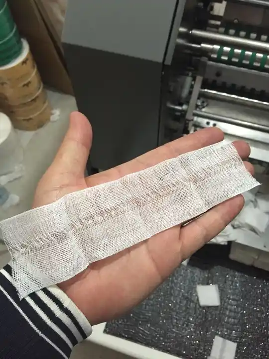 Compact New Generation Medical Hospital Surgical Compress Hospital Gauze Swab Sponge Folding Machine Medical Textile Automatic Compact New Generation Medical Hospital Surgical Compress Hospital Gauze Swab Sponge Folding Machine Medical Textile Automatic