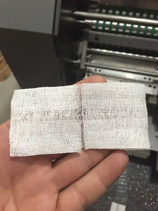 Compact New Generation Medical Hospital Surgical Compress Hospital Gauze Swab Sponge Folding Machine Medical Textile Automatic Compact New Generation Medical Hospital Surgical Compress Hospital Gauze Swab Sponge Folding Machine Medical Textile Automatic